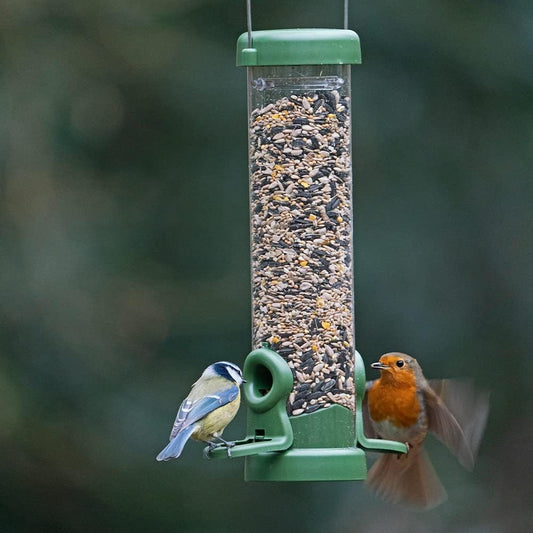 Jacobi Jayne® flo™ Bird Feeder - Bird feeders for small birds. Easy clean bird seed feeder. Won't clog or block. Flo™ hanging bird feeder for wild bird seed. 2 YEAR GUARANTEE. Classic green, small?FLO-S1C