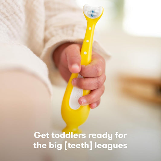 Frida Baby Training Toothbrush | Toddler Toothbrush For 18-24 Months, Easy-Grip Handle, Triple Angle Bristles, Soft Toothbrush Bristles, Stay-Put Suction Cup | Yellow