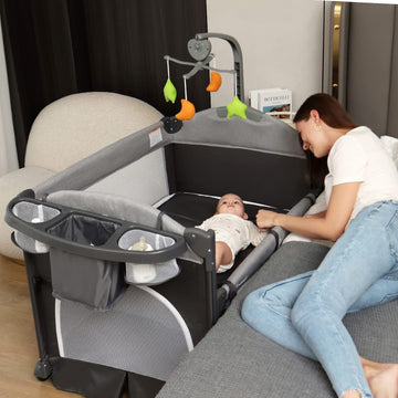 Zdolmy Baby Bedside Sleeper Bassinet, 4-In-1 Pack And Play With Bassinet W/Diaper Changing Table & Storage Bag, 3 Adjustable Heights, Toy Arch & Music, Portable Baby Play Yard With Carry Bag