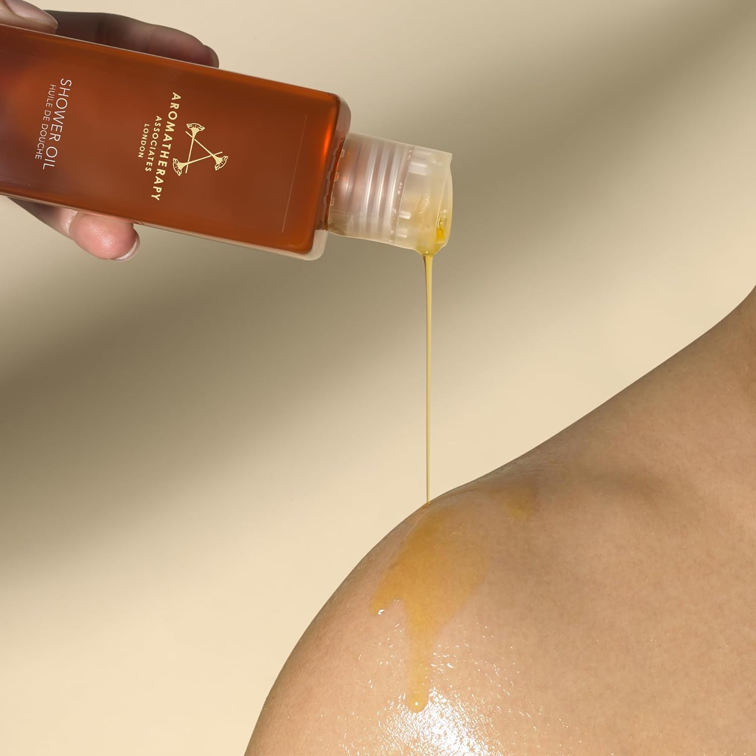 Aromatherapy Associates - De-Stress Muscle Shower Oil - Rosemary, Ginger and Black Pepper Essential Oils - Oil-to-Milk Formula for Hydration and Tension Relief - 250ml : Amazon.co.uk: Beauty