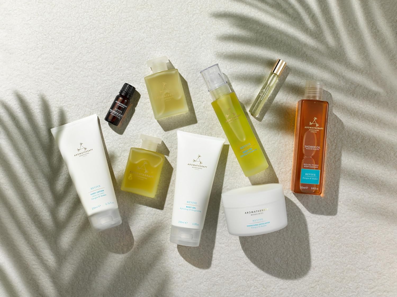 Aromatherapy Associates Body Oil 100 ml - Massage Oil with Juniper Berry, Grapefruit & Rosemary, Home Spa Luxury Body Treatment, Long Lasting & Mood-boosting Fragrance, Natural Ingredients : Amazon.co.uk: Beauty
