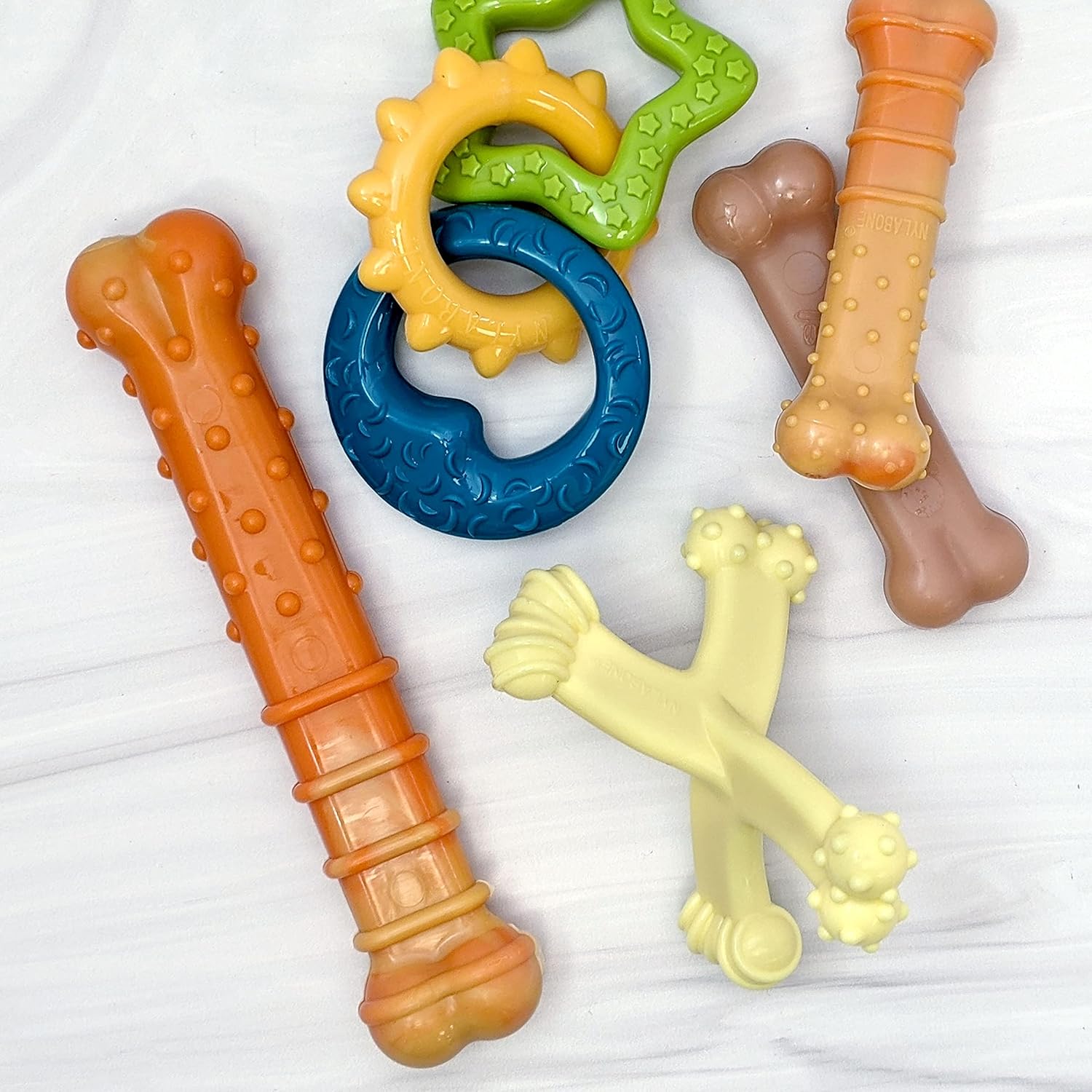 Pet Supplies : Nylabone Puppy Power Chew Toy - Tough and Durable Puppy Chew Toy for Teething - Puppy Supplies - Beef Broth & Vegetable Flavor, Small (1 Count) : Amazon.com